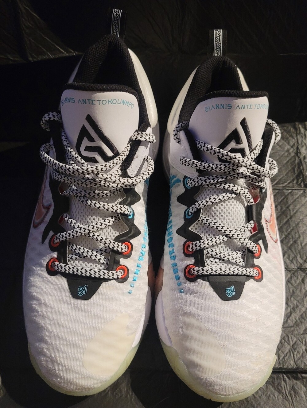 Nike Giannis Immortality Force Field sneakers with pastel accents.